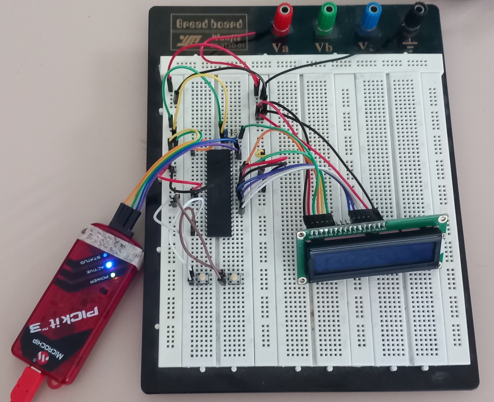 LastWord breadboard prototype with PIC microcontroller, LCD and programmer